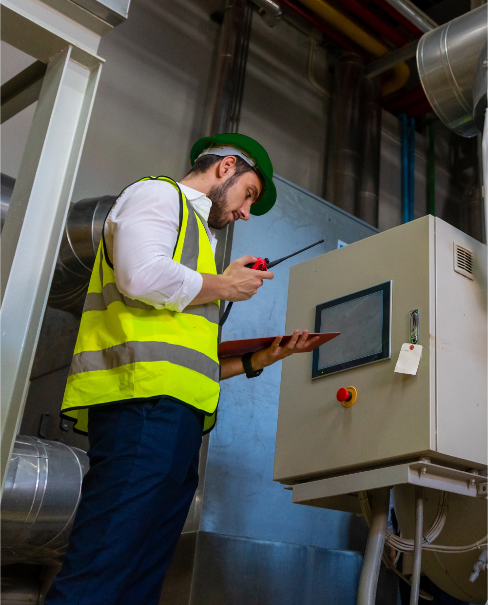 Worker Inspecting Panel