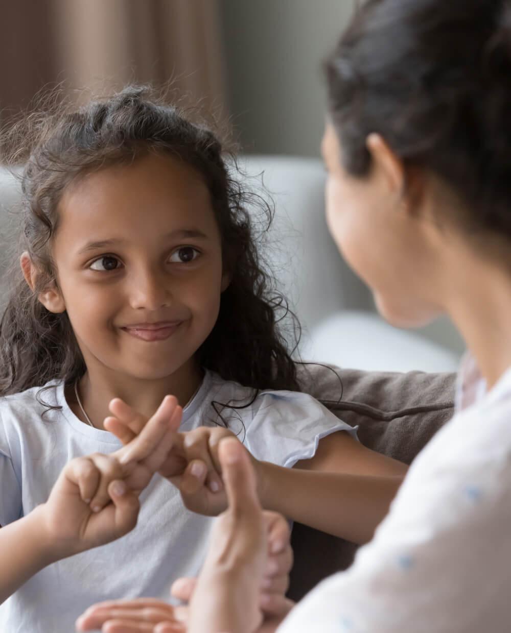 deaf child signing